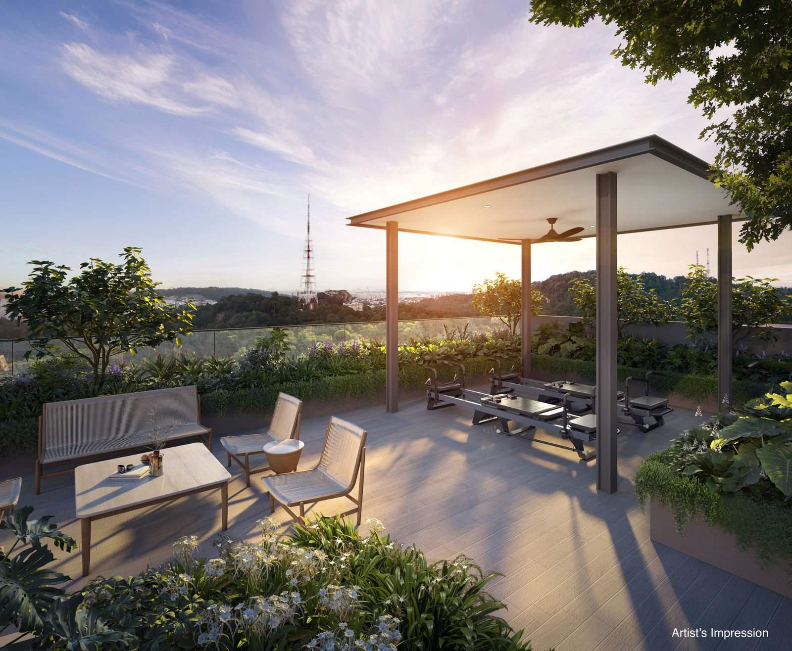 The rooftop pavilion at The Sen at sunset, with lounge seating, a ceiling fan and a long view over the Bukit Timah tree canopy